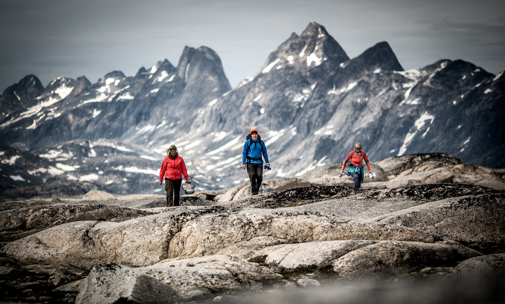 Three_hikers_in_the_mountains_near_Qernertivartivit_not_far_from_Kulusuk_in_East_Greenland_slider_1750934575.jpg